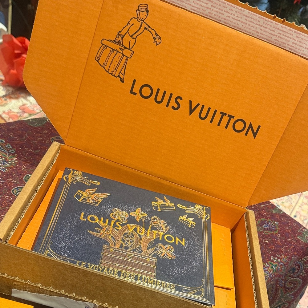 Original Louis Vuitton Special edition Gold and Navy bag.Perfect for collectors.